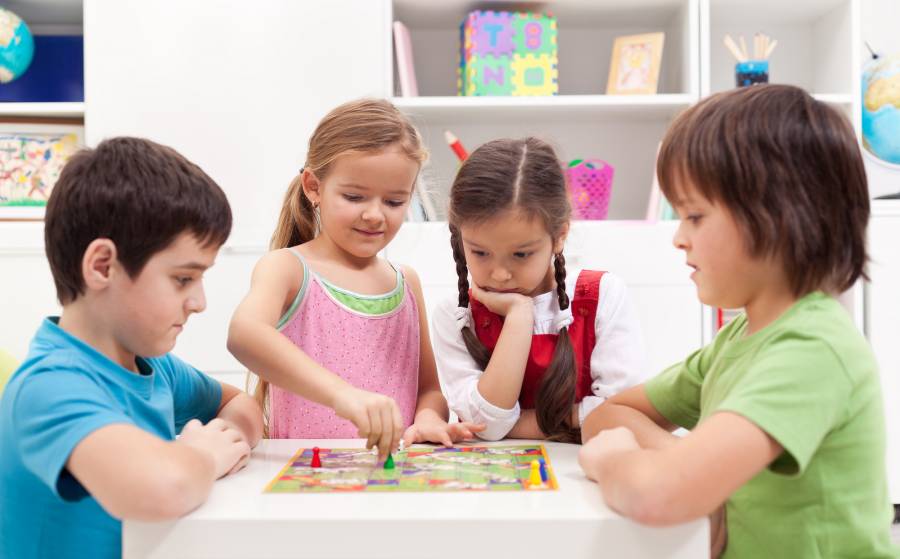Children playing board game